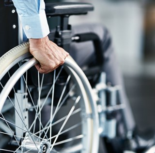 closeup of business man in wheelchair