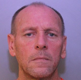 mugshot of John H. Bretz