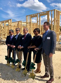 groundbreaking at mirrorton - City and Mirrorton officials posing with shovels