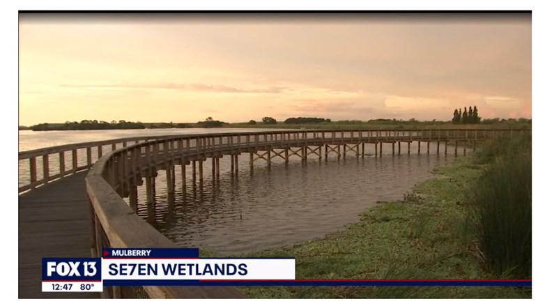 sunrise over boardwalk and lake cell 5