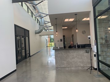 Interior of Lake Crago Outdoor Recreation Complex looking down a hallway at the front desk