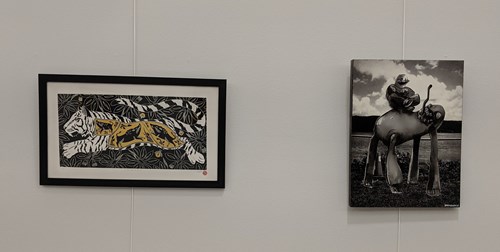 Photos of framed art on the wall at Kelly Rec