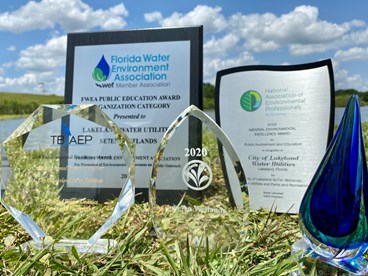 photo of awards displayed outside in grass