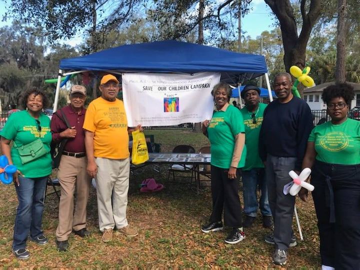 Neighborhood leaders at a "Save Our Children" event.