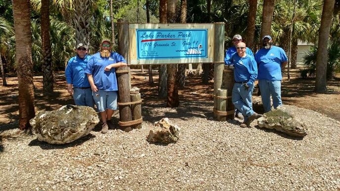 Members of the Parks and Recreation Department at Lake Parker Park located in the Granada neighborhood.