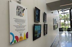 Arts & Rec Exhibit Space at the Lake Crago Outdoor Recreation Complex Rec building. This exhibit space is  located in a hallway behind the main check-in space. Guests utilize this space en route to two of the educational classrooms/meeting spaces.
