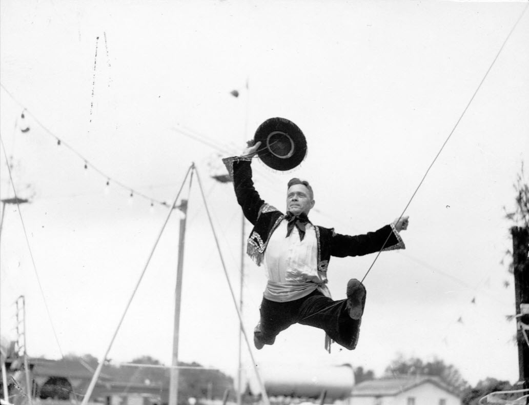 Floyd Bernard was a circus performer and aerialist who used a a number of stage names during his fifty year entertainment career.  Among them were Floyd Merrill and, as pictured here, Don Bernardo, king of the swinging wire.; link to contentDM "Bernard Family Photos" collection