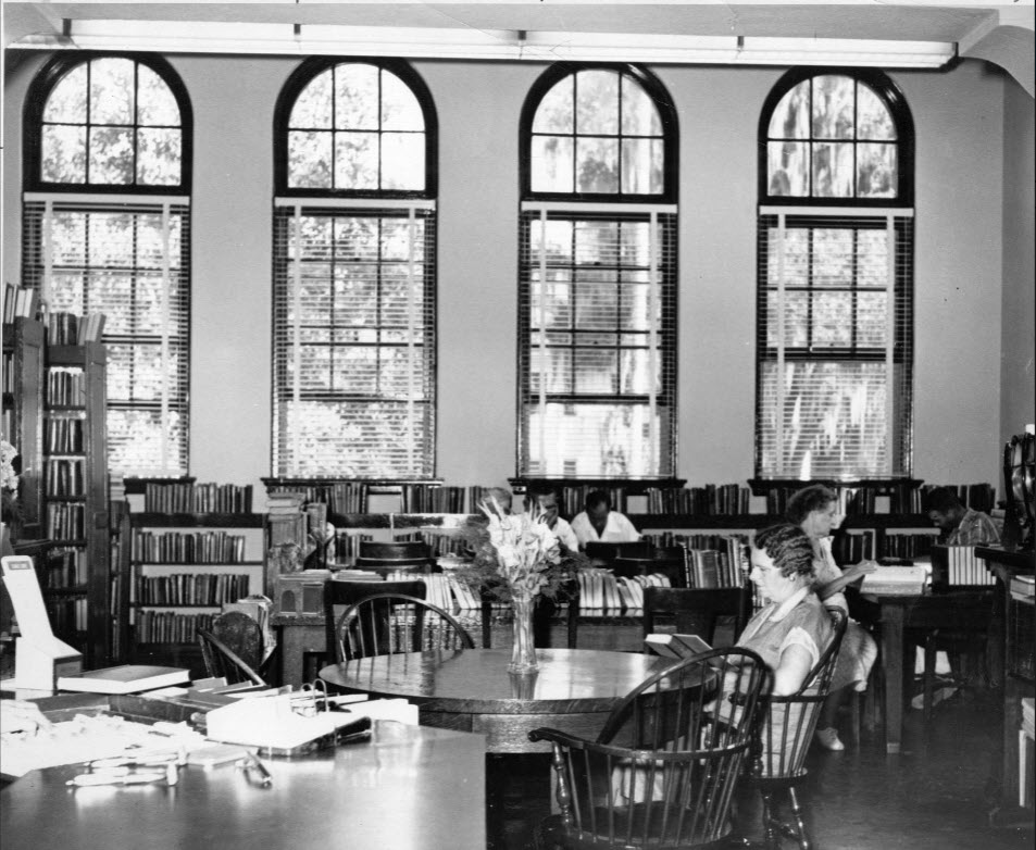 Patrons enjoy a relaxing day with a good book in the adult reading room of the Lakeland Public Library, then called the Park Trammell Building, in Lakeland, Florida in 1955; link to contentDM "Lakeland Public Library Through the Years" collection