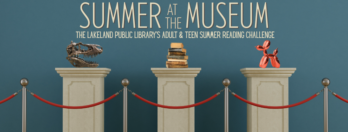 Three pedestal stands behind red velvet rope and metal stanchions, with each pedestal hold a dinosaur skull, stack of old books, and balloon dog pop art sculpture respectively. Text above reads "Summer at the Museum; The Lakeland Public Library's Adult & Teen Summer Reading Challenge"