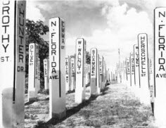 Freshly painted street signs lined up at City of Lakeland Public Works yard waiting their final destination in 1939; link to "Signs of the Time" Flickr album