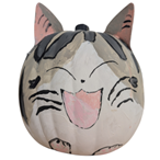 Craft pumpkin painted to look like a gray and white striped cat with a smiling face and attached ears