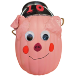 Craft pumpkin painted pink with a pig's face and black hat